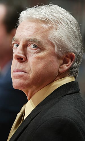 Blackhawks player development director Barry Smith has coached in the KHL.